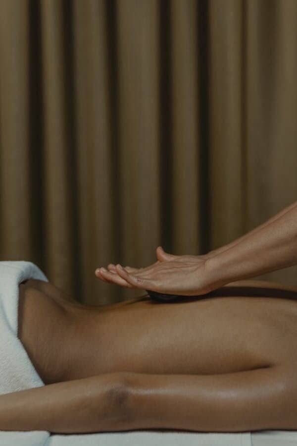 Gua sha back facial massage at Kamil Esthétique